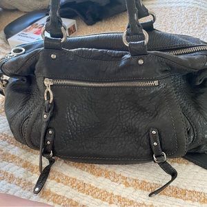 Lancaster black leather bag